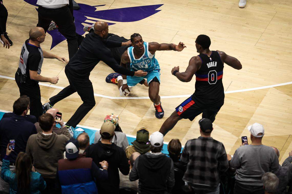 Moussa Diabate (14) of the Charlotte Hornets fights Jalen Duren (0) of the Detroit Pistons during the second half at Spectrum Center on Feb. 9, 2026 in Charlotte, North Carolina.