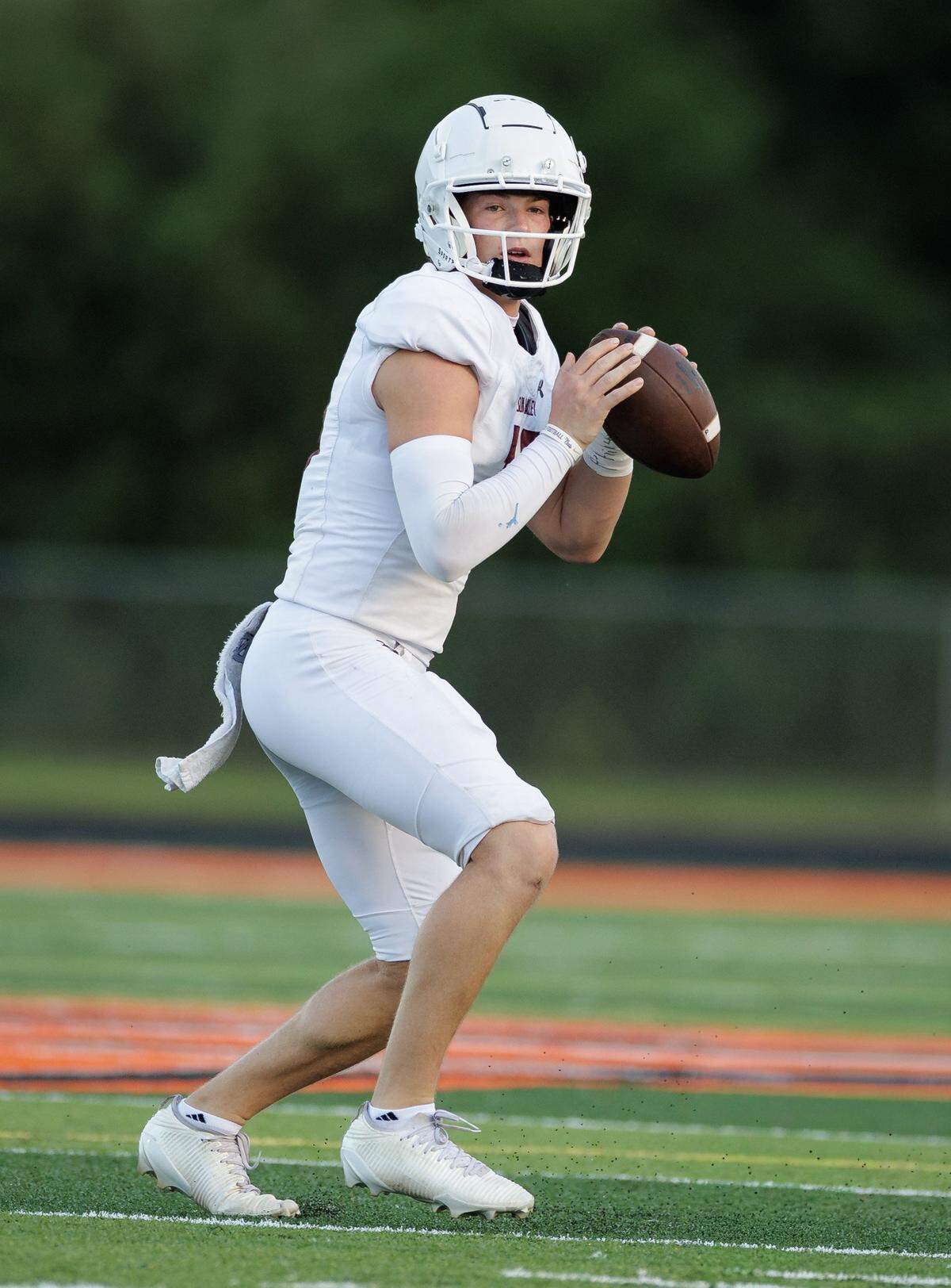 Senior quarterback Noah Lineberry drops back during a preseason scrimmage against Ardrey Kell. A standout for the Spartans, Lineberry has drawn interest from several Division I programs thanks to his strong arm and field awareness. With recruitment heating up, he’s expected to be a key leader in Sun Valley’s 2025 campaign. August 15, 2025.