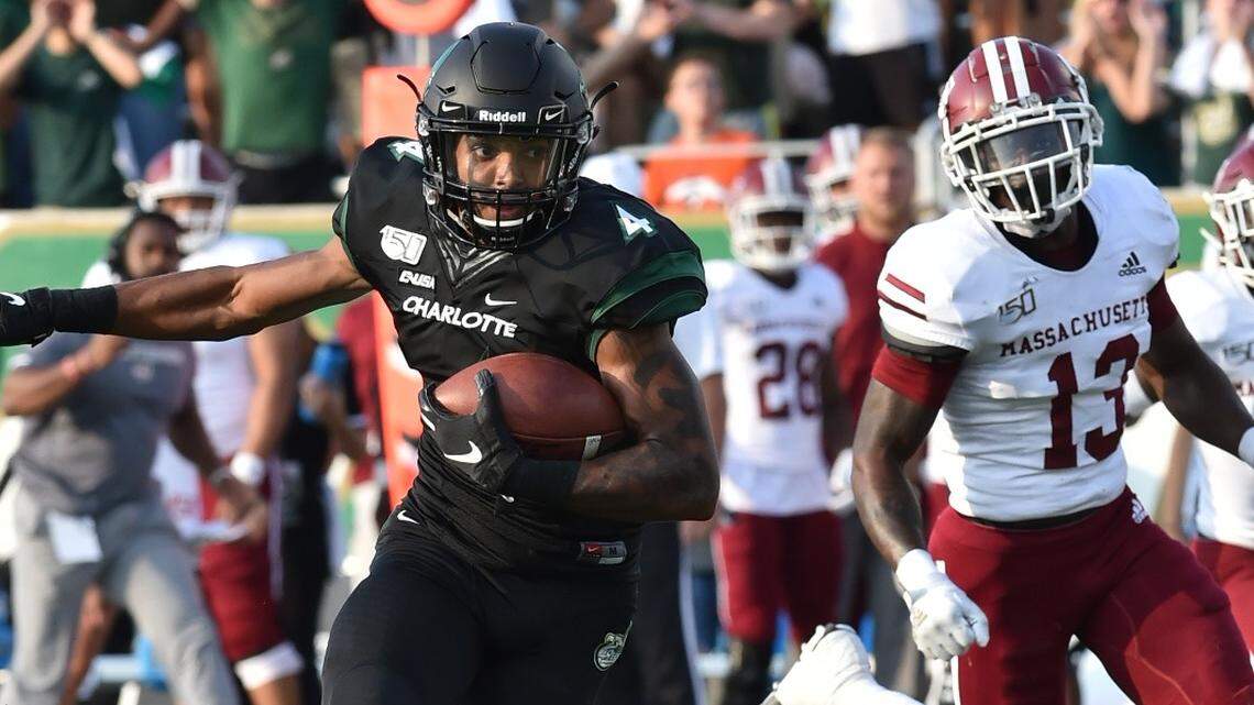 Charlotte 49ers receiver Cam Dollar (4) caught a 46-yard touchdown pass in the first quarter against Massachusetts on Saturday. SAM ROBERTS