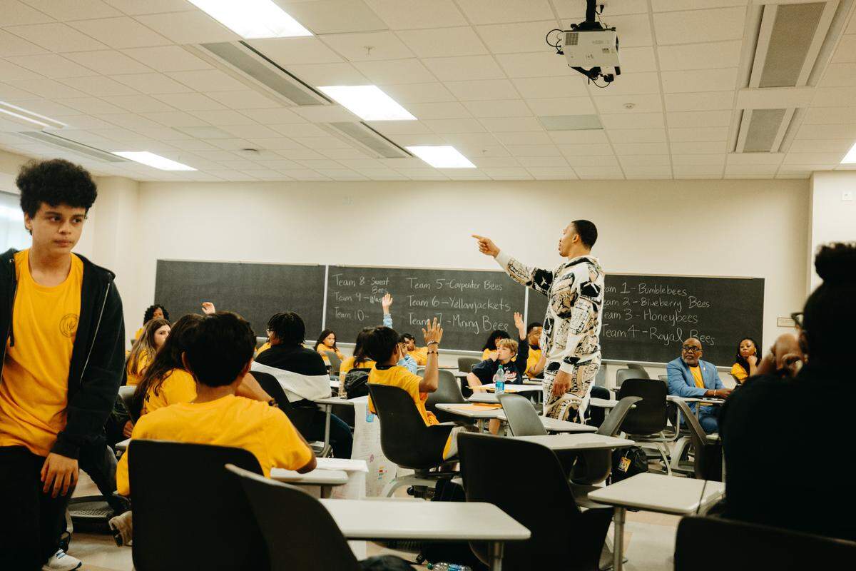 Grant Williams speaks to students at his second annual Hackathon on April 4, 2025.