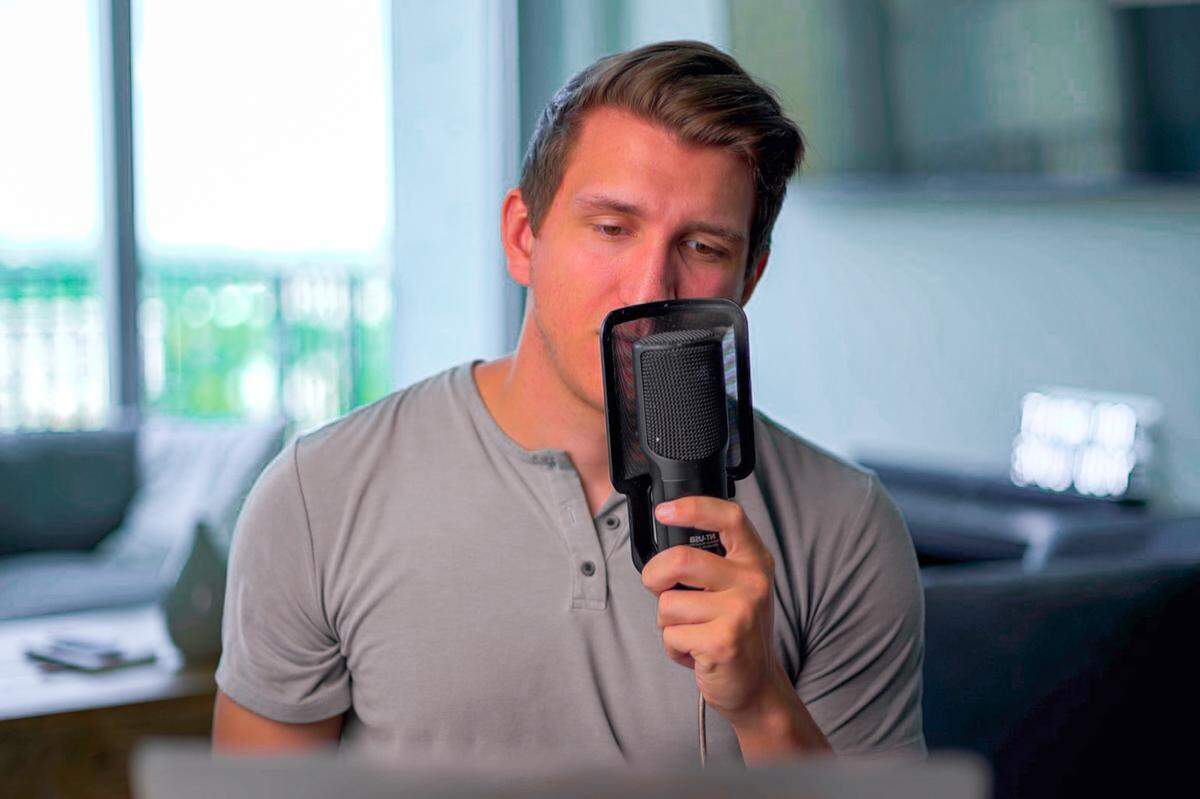 Cameron Glenn, the owner and founder of the videography production company Skyvisions USA, uses professional equipment to make sure his lighting, audio and video is top-notch during videoconferencing.