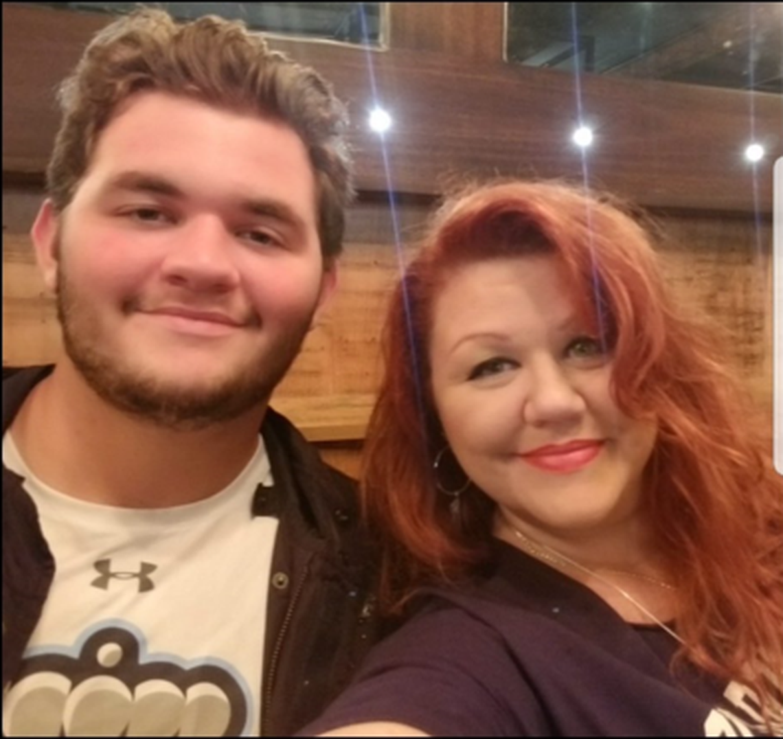 Parkwood High alum Nick Saldiveri and his mother, Jennifer Townsend, pose for a photo together.
