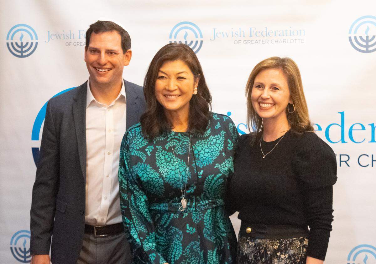 From left, David Sheffer, Juju Chang and Julie Sheffer at the kickoff for the Jewish Federation of Greater Charlotte’s annual fundraiser on Jan. 19, 2023. This year the federation is refocused on strengthening Jewish pride against growing antisemitism.