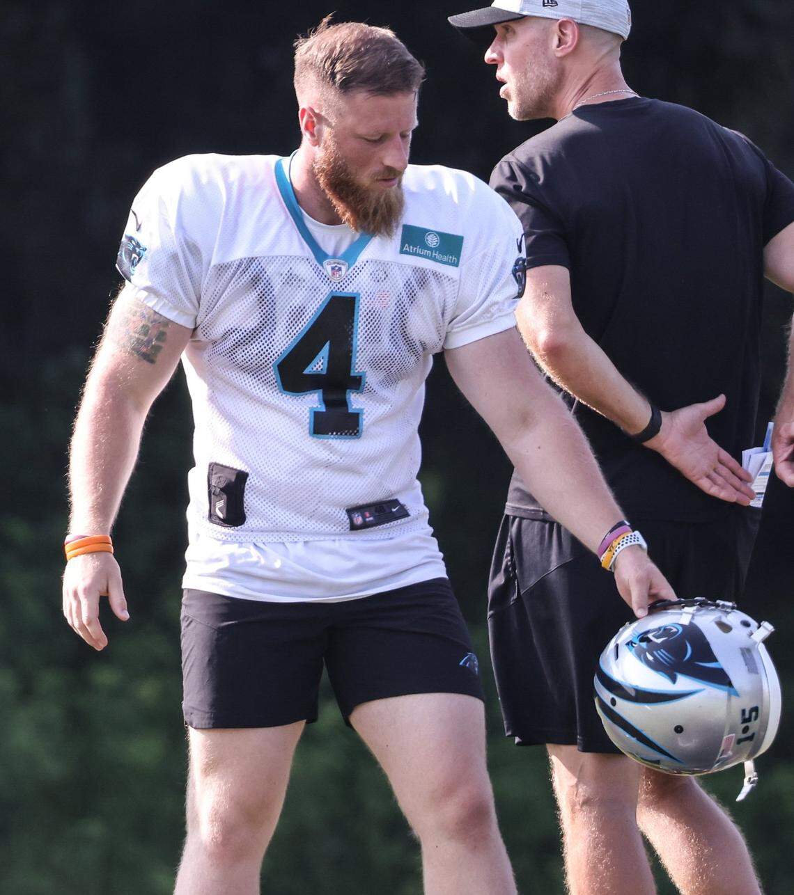 Carolina Panthers Joey Slye sits his helmet down during the Carolina Panthers training camp at Wofford College in Spartanburg, S.C., on Monday, August 2, 2021.