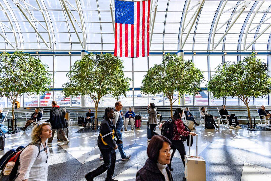 Passengers travel through Charlotte Douglas International Airport. The facility offers a variety of things to do for those with a layover.