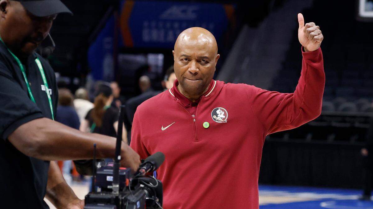 Florida State head coach Leonard Hamilton acknowledges the crowd as he walks off the court for the last time after Syracuse’s 66-62 victory over Florida State in the first round of the 2025 ACC Tournament at the Spectrum Center in Charlotte, N.C., Tuesday, March 11, 2025.