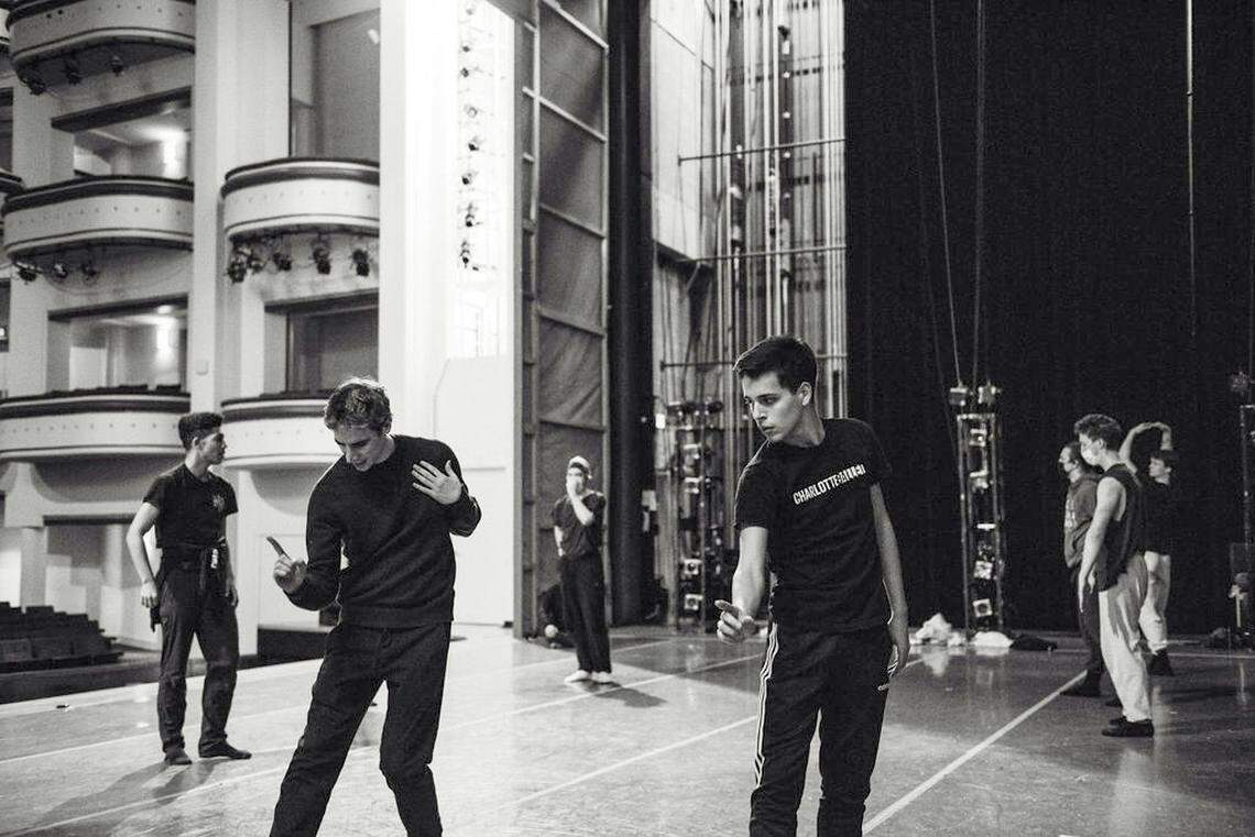 Charlotte Ballet Artistic Director Alejandro Cerrudo working with company members.