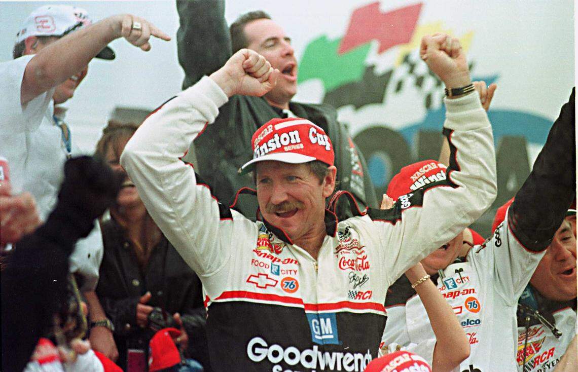 Dale Earnhardt celebrates at Daytona International Speedway on Feb. 16, 1998, after winning the Daytona 500. It was the only major race Earnhardt hadn’t won. An “impeccably preserved” No. 3 Dale Earnhardt race car tops the list of memorabilia his longtime friend and NASCAR team owner Richard Childress is auctioning off to benefit COVID-19 relief efforts.