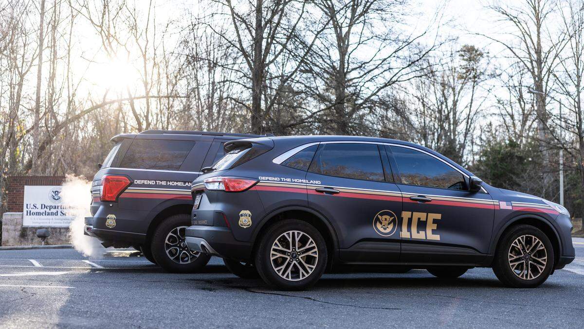 ICE vehicles at the entrance of the Department Homeland Security office in Charlotte, N.C., on Wednesday, January 21, 2026.
