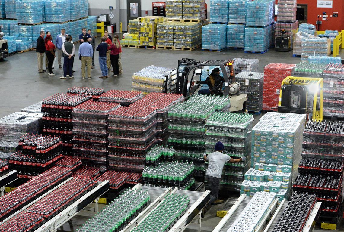 Pallets of Coca-Cola product inventory wait to be sorted for orders in the automated warehouse at the Vertique Distribution Center.