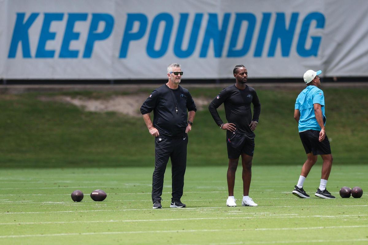 Panthers head coach Frank Reich, left, watches practice during the first day of mandatory mini camp on Tuesday, June 13, 2023 at the practice fields behind Bank of America Stadium.