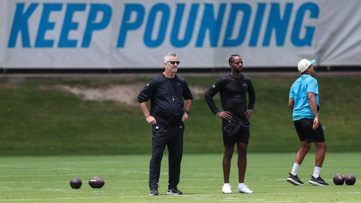 Panthers head coach Frank Reich, left, watches practice during the first day of mandatory mini camp on Tuesday, June 13, 2023 at the practice fields behind Bank of America Stadium.