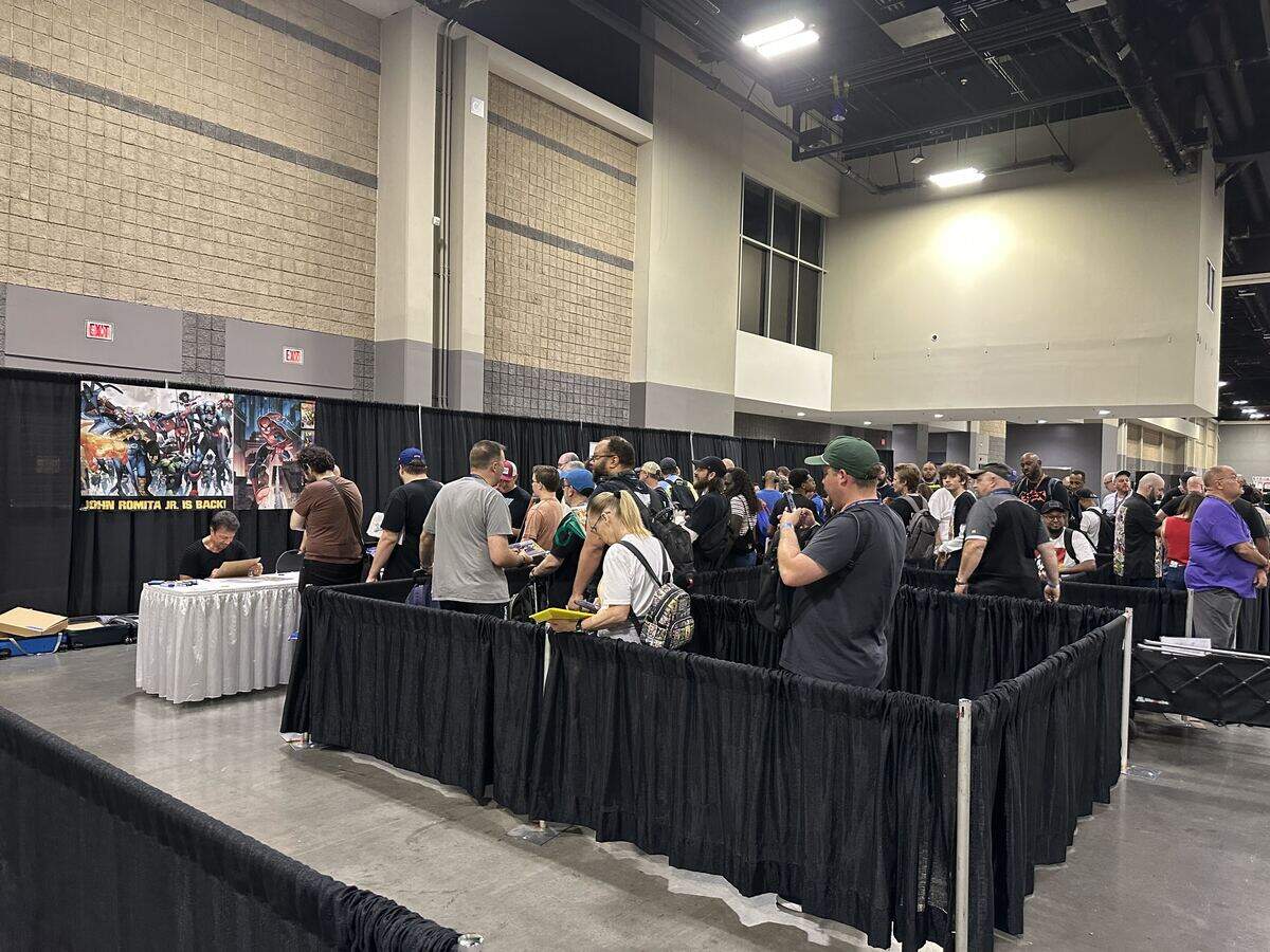 Fans line up for a chance to meet comic book artists and writers like John Romita Jr., known for his work on “Spider-Man” and “Kick Ass.”