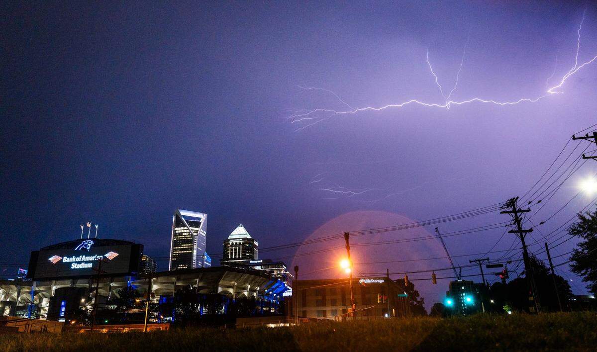Lighting strikes near the Charlotte skyline on July 25, 2024.