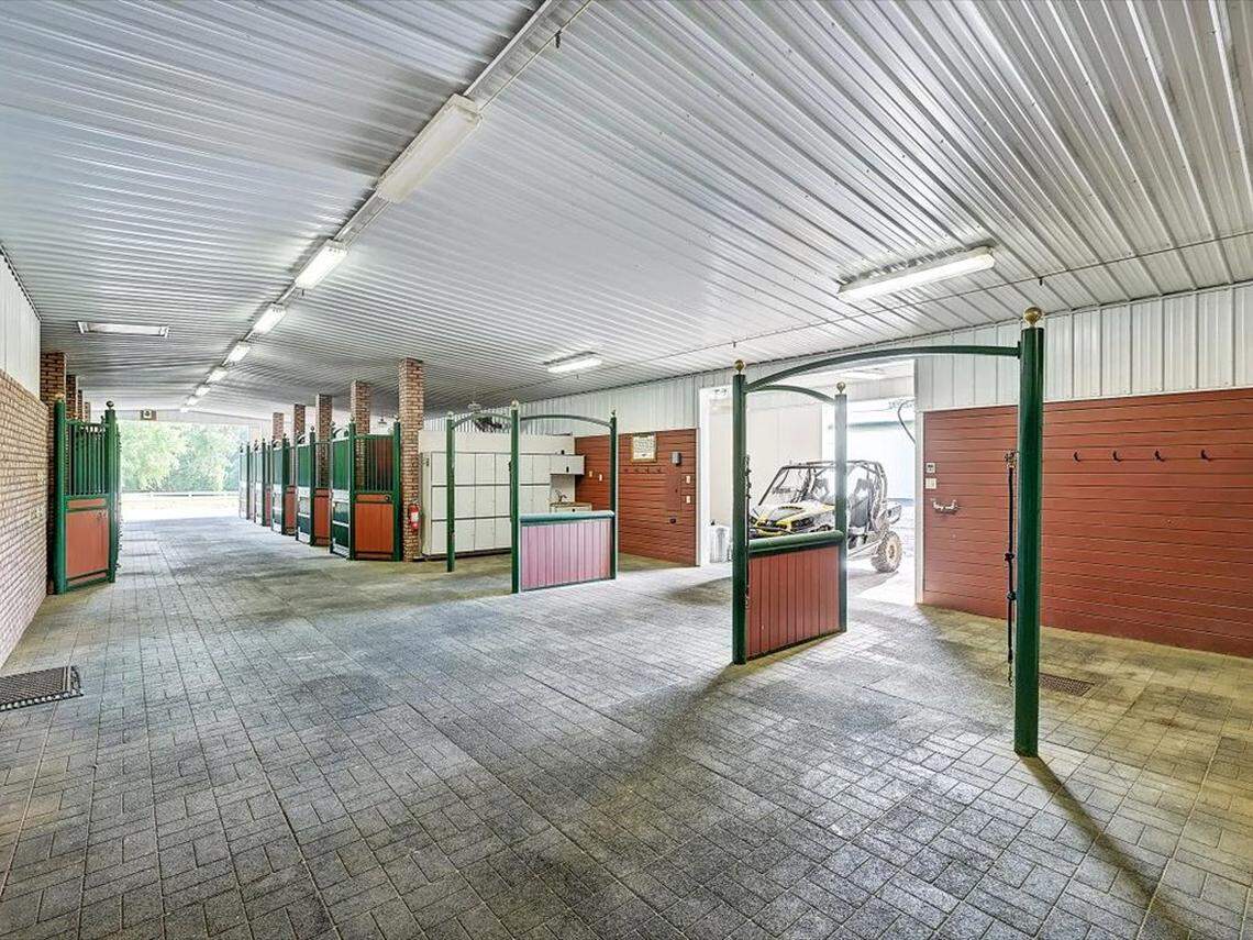 The property includes these interior barn stalls.