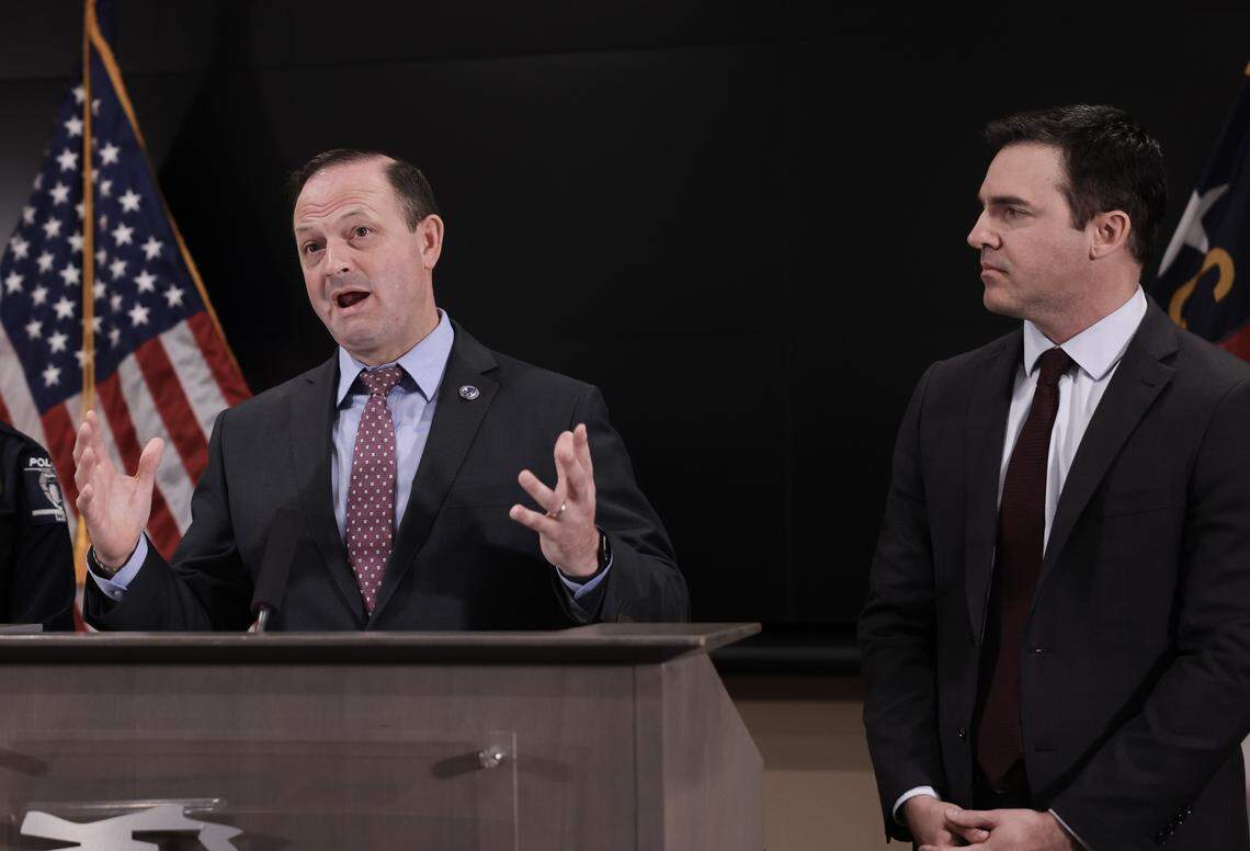 South Carolina Attorney General Alan Wilson, left, speaks about fentanyl money laundering next to North Carolina Attorney General Jeff Jackson during a press conference Monday, March 23, 2026 at the Charlotte-Mecklenburg Police Headquarters.