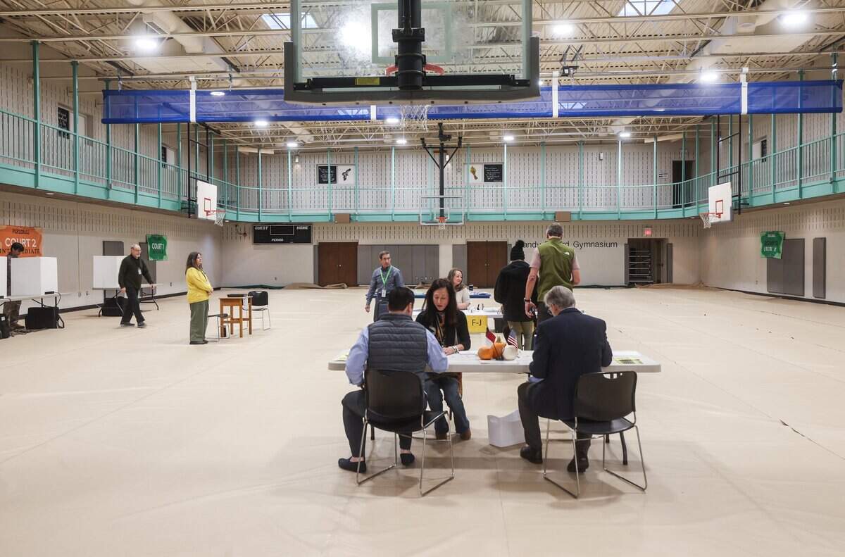 Voters cast their ballots in precinct 36 at Providence Baptist Church in Charlotte.