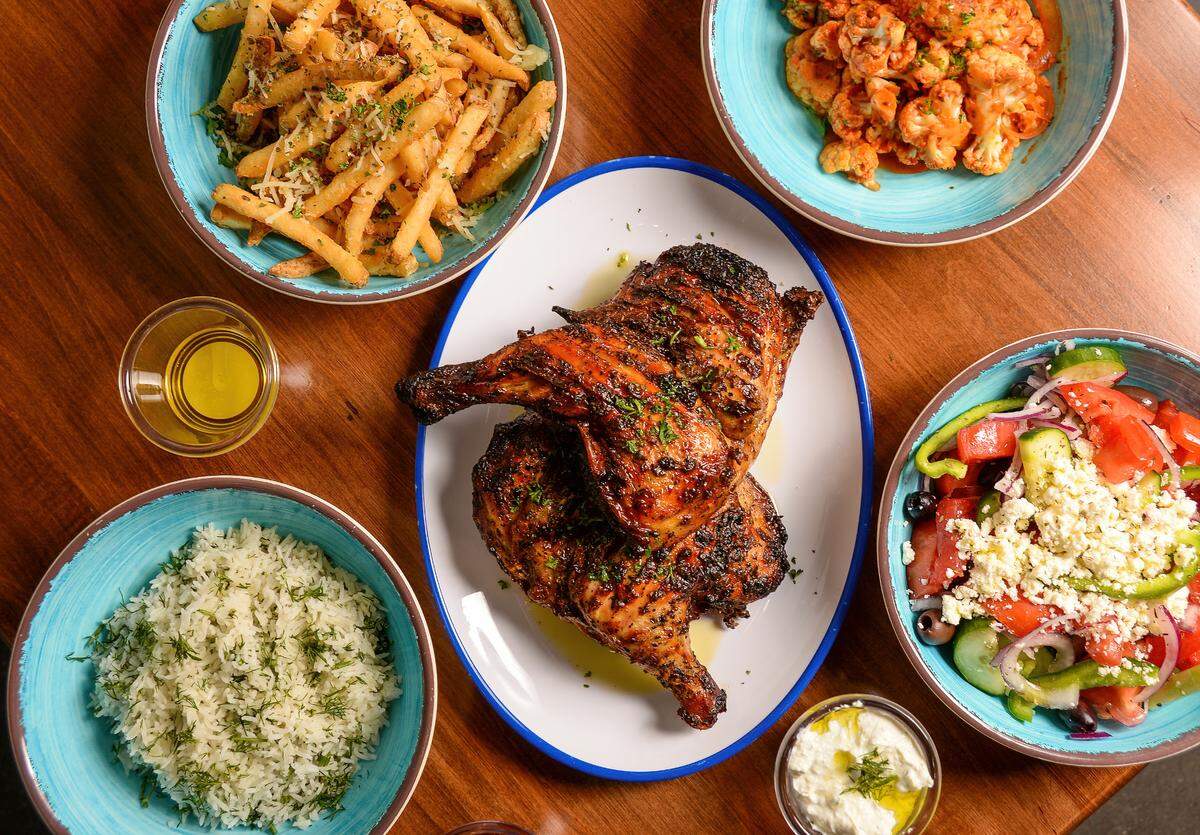 Illios Crafted Greek’s family meal features a choice of protein plus two large sides, Greek Salad or Ilios Salad, pita and a choice of a sauce for $39.95.
