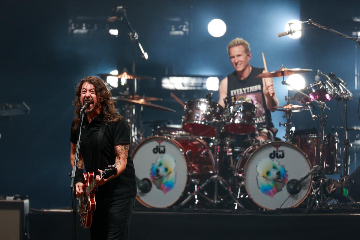 Lead singer and guitarist Dave Grohl of Foo Fighters performs alongside drummer Josh Freese at PNC Music Pavilion in Charlotte on Thursday night.