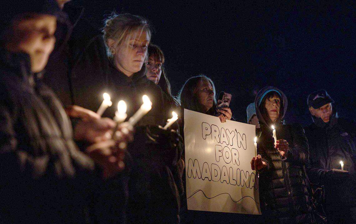 The community gathers for a candlelight vigil for Madalina Cojocari, 11, in Cornelius, N.C., on Tuesday, December 20, 2022.