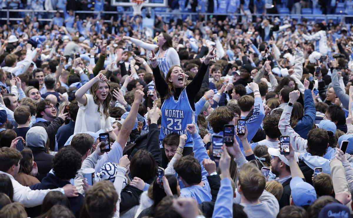 North Carolina fans celebrate after UNC’s 71-68 victory over Duke at the Dean E. Smith Center in Chapel Hill, N.C., Saturday, Feb. 7, 2026.