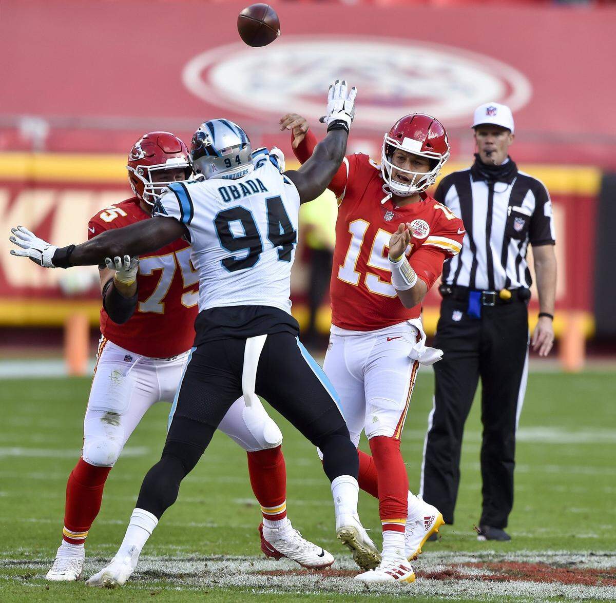 Kansas City Chiefs quarterback Patrick Mahomes throws while being pressured by the Carolina Panthers’ Efe Obada at Arrowhead Stadium Sunday, Nov. 8, 2020. The Chiefs beat the Panthers 33-31.