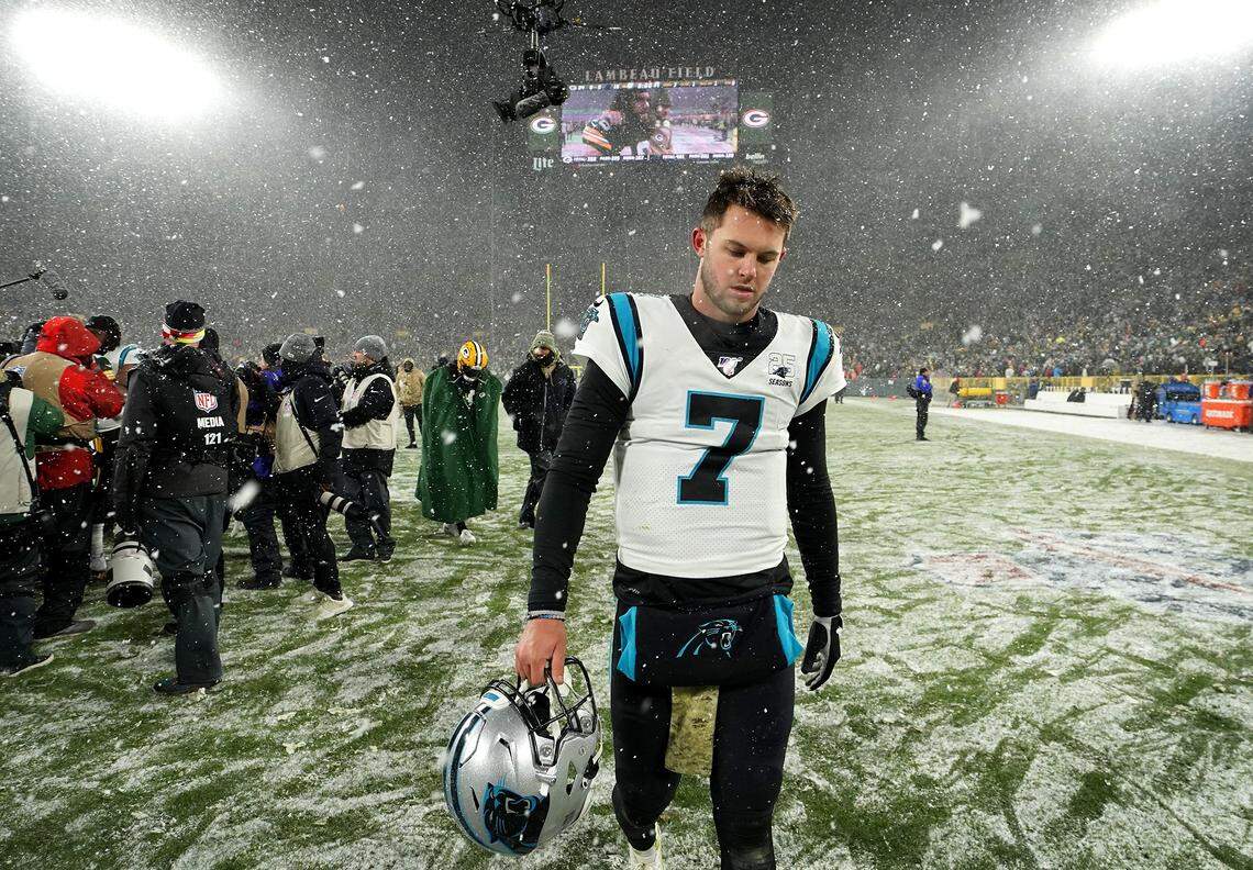 Carolina Panthers quarterback Kyle Allen walks off the field dejected following the team’s loss to the Green Bay Packers 24-16 at Lambeau Field. The Panthers ended the game on the Green Bay 1, inches short of a potential game-tying touchdown.