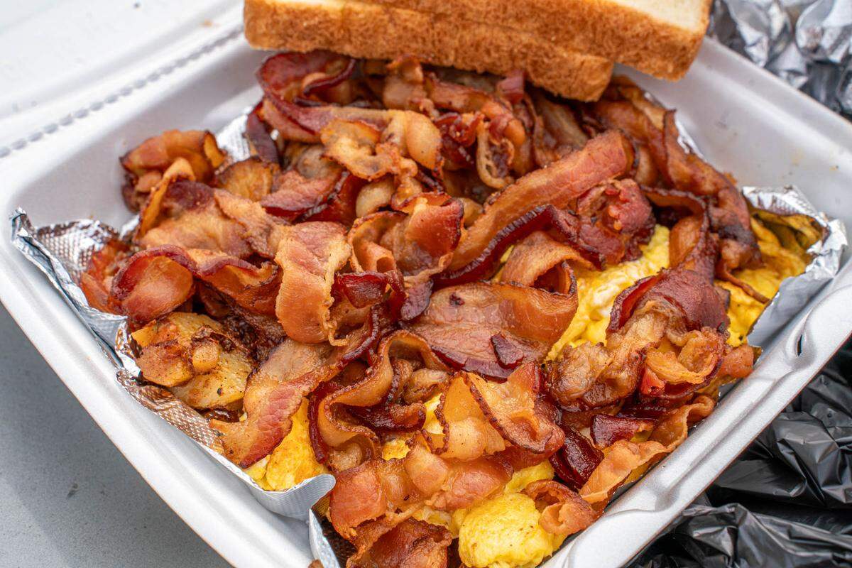 The breakfast platter with bacon at Bob’s Carry Out Pile ‘Em Up.