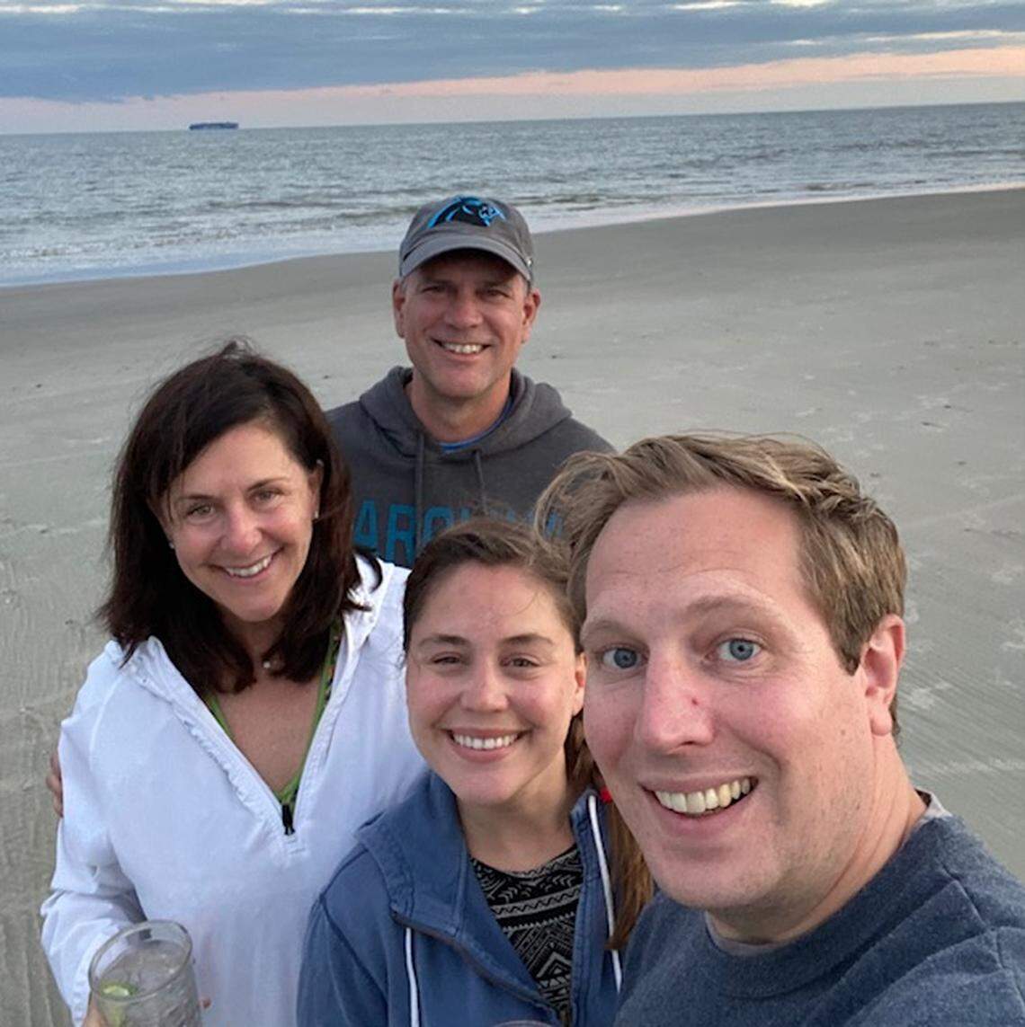 Clockwise from the top: Greg Jones, Noah, Kelsey, and Jennifer, in a photo taken earlier this year. They’ll return to the beach this week for a scaled-down Thanksgiving.
