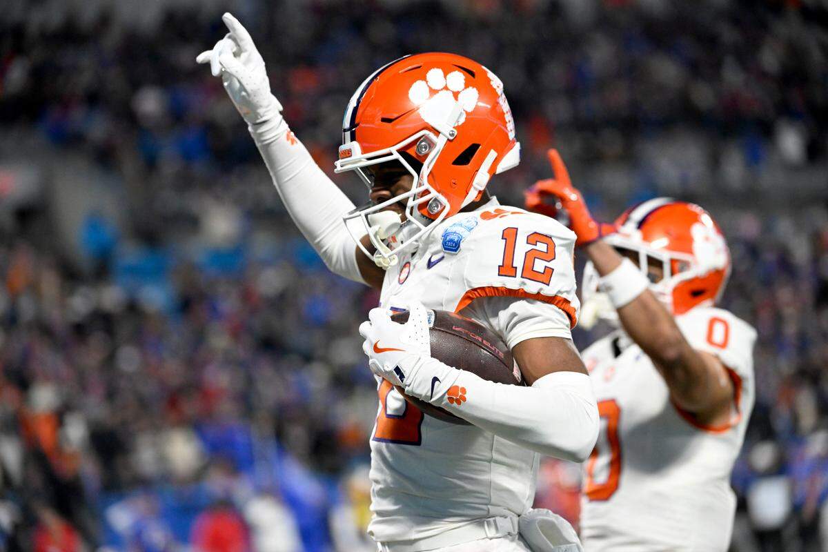 Clemson Tigers wide receiver Bryant Wesco Jr. (12) reacts after scoring a touchdown during the first quarter against the Southern Methodist Mustangs in Saturday’s 2024 ACC Championship game at Bank of America Stadium. Bob Donnan-Imagn Images