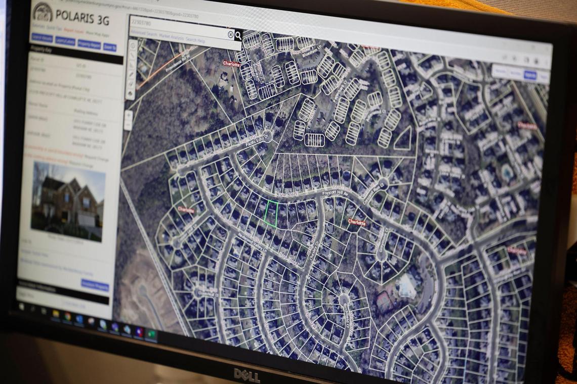Senior appraiser David Strafel uses a variety of sources to check sales prices and other data points to determine the value of properties across Mecklenburg County.