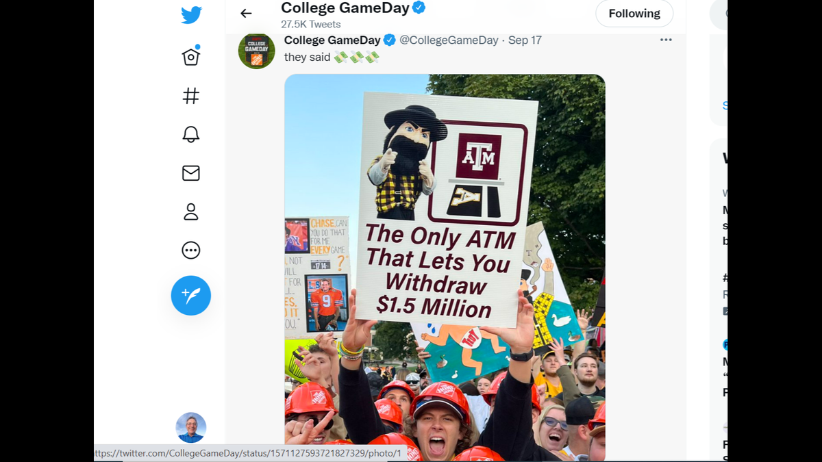 Appalachian State University freshman Zackary Carr holds the poster that won him a free year of tuition during the ESPN College GameDay show on Sept. 17, 2022.