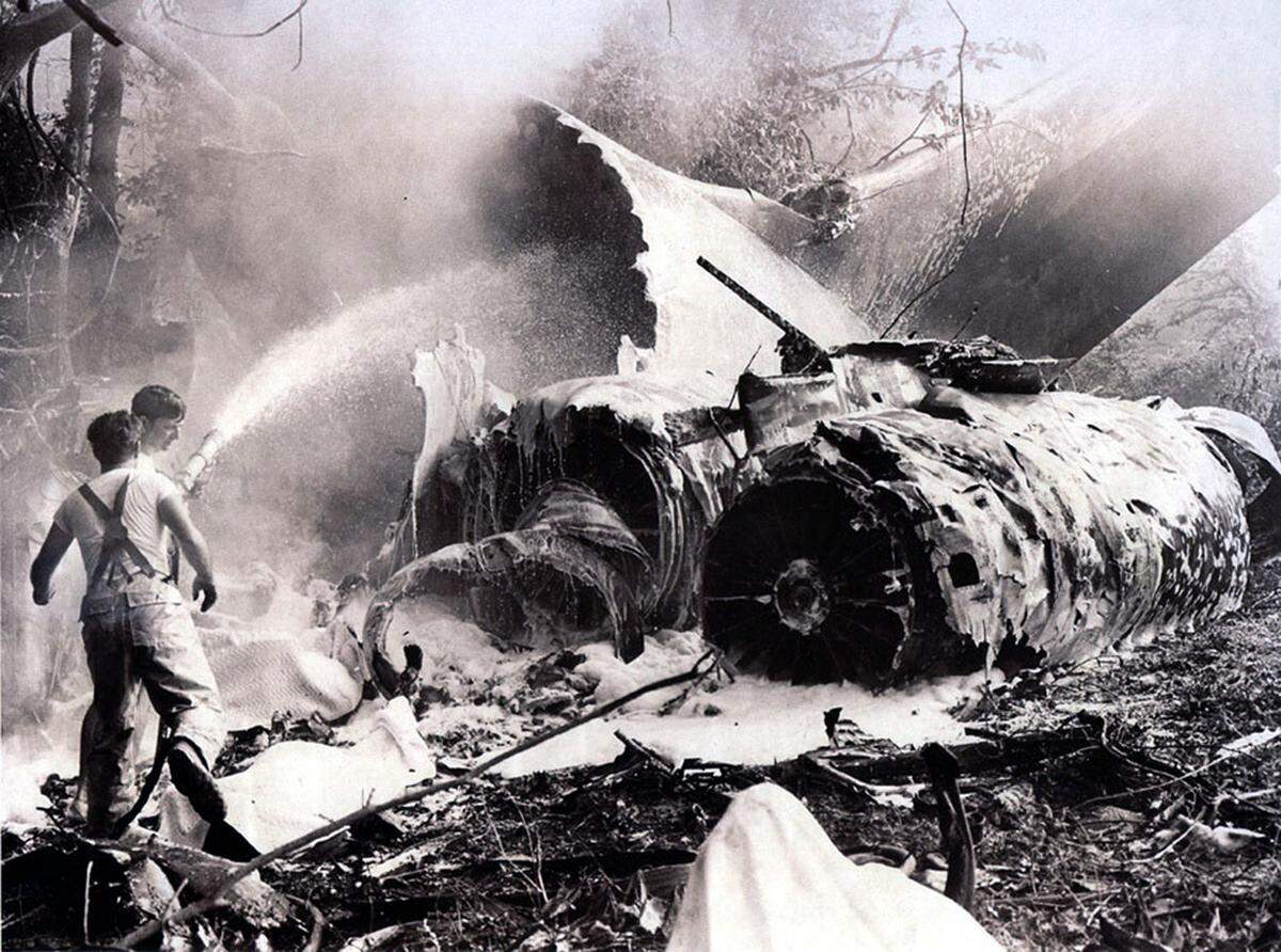 Firefighters on the scene of the Eastern Airlines Flight 212 crash in Charlotte on Sept. 11, 1974.