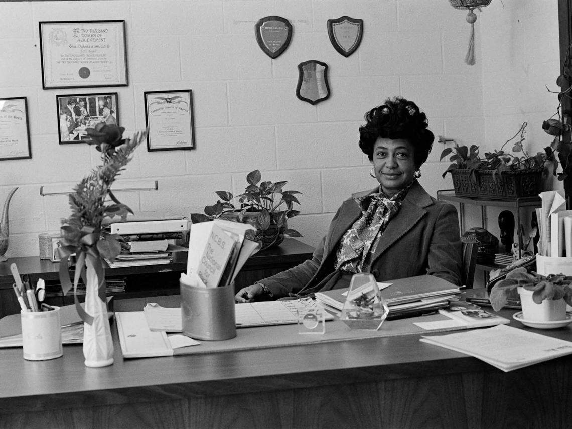Bertha Maxwell-Roddey at her desk at UNC Charlotte, circa the late 1960s-mid 1970s.