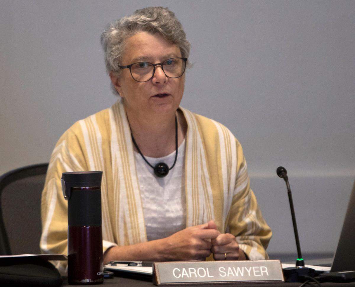Member Carol Sawyer speaks during a Charlotte-Mecklenburg Board of Education meeting in Charlotte, N.C., on June 28, 2022.