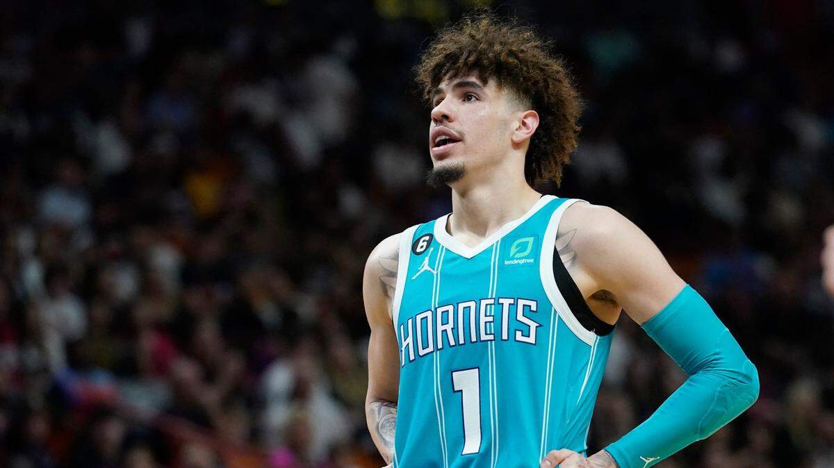 Charlotte Hornets guard LaMelo Ball (1) pauses during the second half of an NBA basketball game against the Miami Heat Saturday, Nov. 12, 2022, in Miami. (AP Photo/Marta Lavandier)