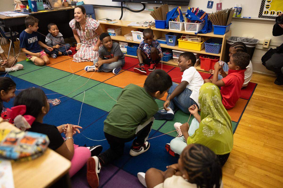 CMS Superintendent Dr. Crystal Hill visits a classroom during the first day of school at Elizabeth Traditional School in Charlotte, N.C., on Monday, August 25, 2025.