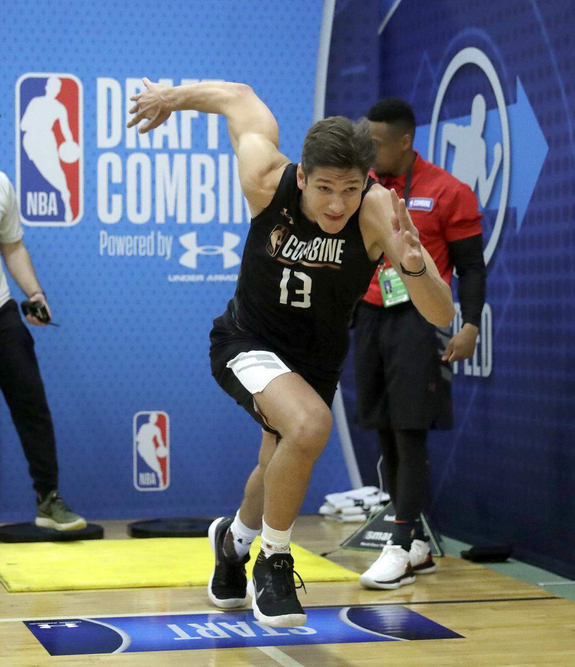 Duke's Grayson Allen won't participate in five-on-five at the NBA draft basketball combine, but he went through agility drills for scouts on Thursday, performing very well. /)