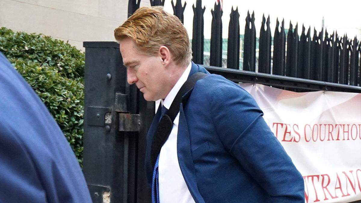 Greg Lindberg enters the federal courthouse in Charlotte on Monday, Feb. 24, 2020, for a hearing. 