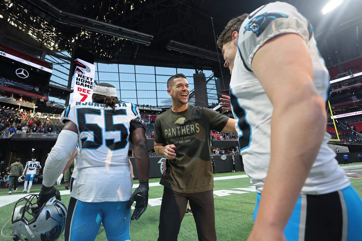 Head coach Dave Canales of the Carolina Panthers celebrates with players after the game against the Atlanta Falcons at Mercedes-Benz Stadium on Nov. 16, 2025 in Atlanta, Georgia. (Photo by Jonathan Bachman/Getty Images)