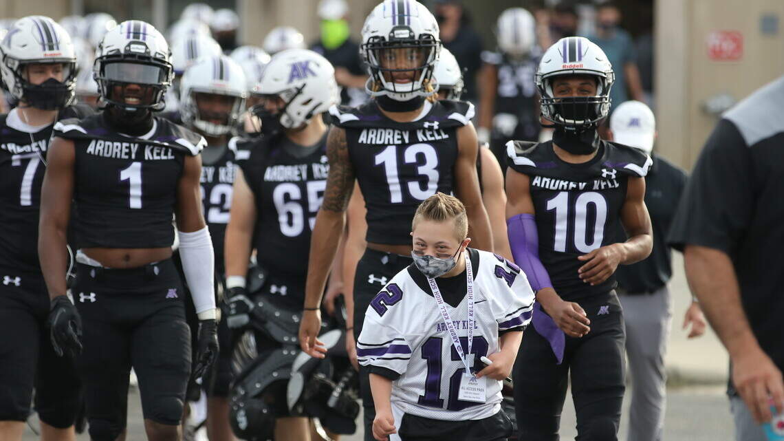 Charlotte high school football team helps fifth grader live his dream