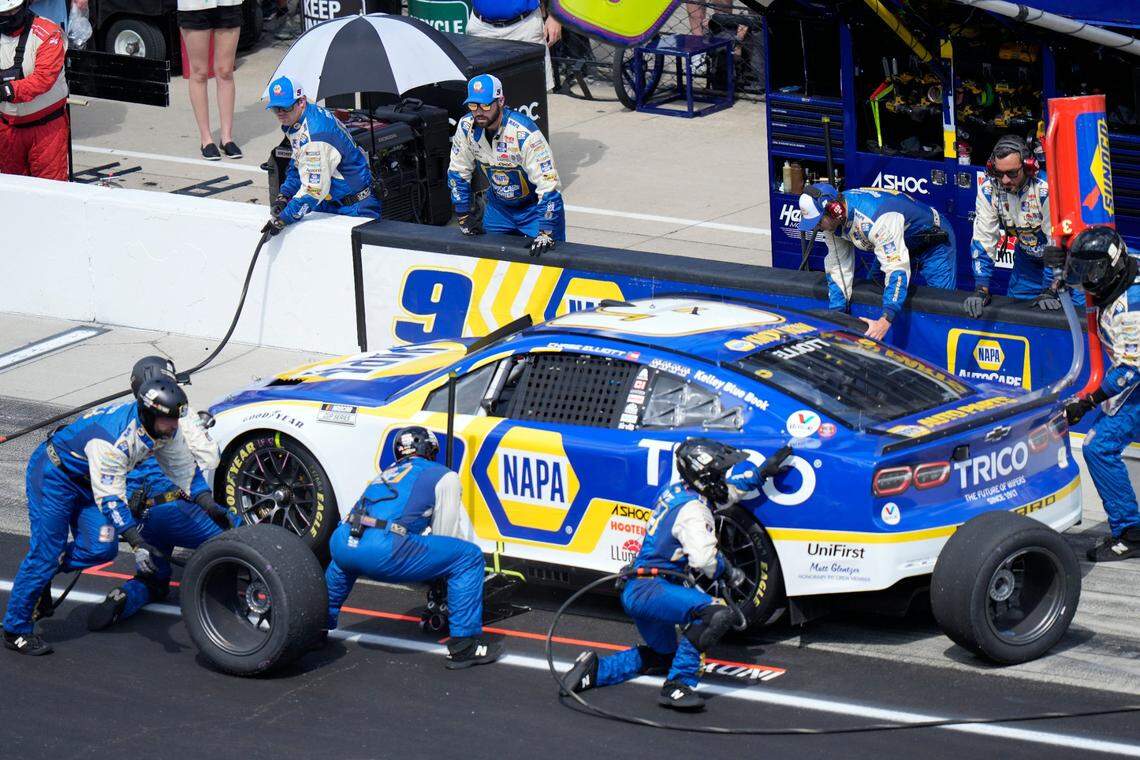 Chase Elliott makes a pit stop during the running of the NASCAR Cup Series auto race at Indianapolis Motor Speedway, Sunday, July 31, 2022, in Indianapolis. (AP Photo/AJ Mast)