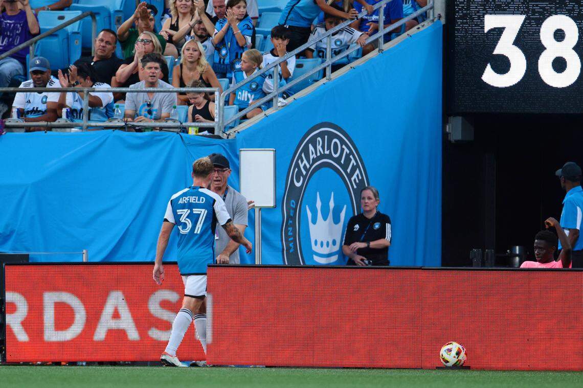 Charlotte FC midfielder Scott Arfield (37) walks off after getting a red card against the Orlando City during Wednesday’s first half at Bank of America Stadium. Scott Kinser-USA TODAY Sports