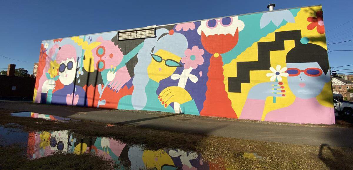 Find Emily Eldridge's Talking Walls Mural at 108 S. Torrence St.