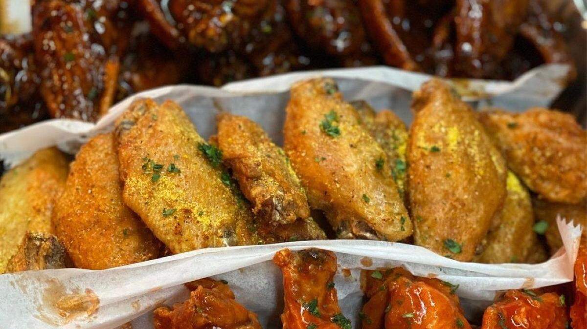 Cuzzo’s Cuisine offers chicken wing flavors including jerk, hot, BBQ, Cajun and lemon pepper.