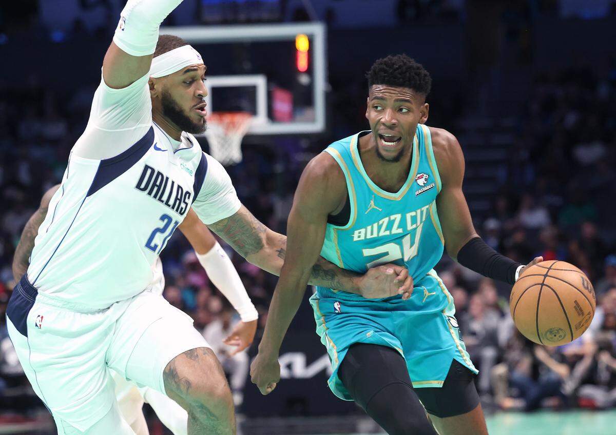 Charlotte Hornets forward/guard Brandon Miller tries to drive against Dallas in April. Miller wants to improve his muscle mass and add more weight this season “just to be able to take bumps from guys.”