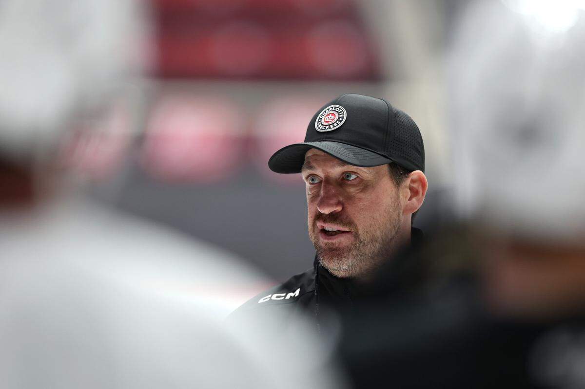Charlotte Checkers coach Geordie Kinnear speaks to the team during practice on Thursday, October 12, 2023. The Checkers open their AHL season on Friday night at Bojangles Coliseum in Charlotte, NC.