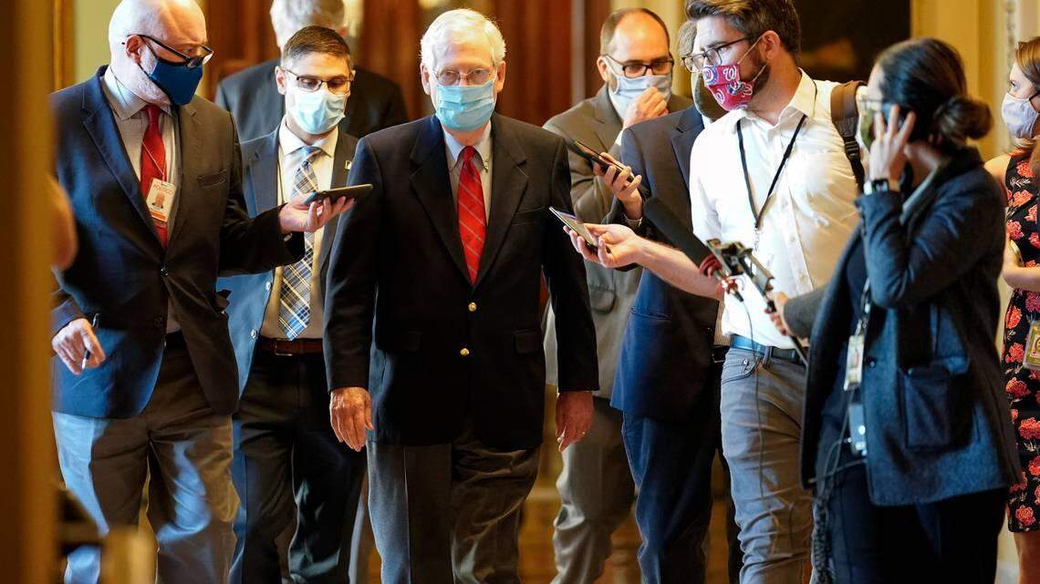 Senate Majority Leader Mitch McConnell talks with reporters after speaking Nov. 9 on the Senate floor. McConnell and others in the Republican Party have declined to push President Trump to accept the outcome of the 2020 election.
