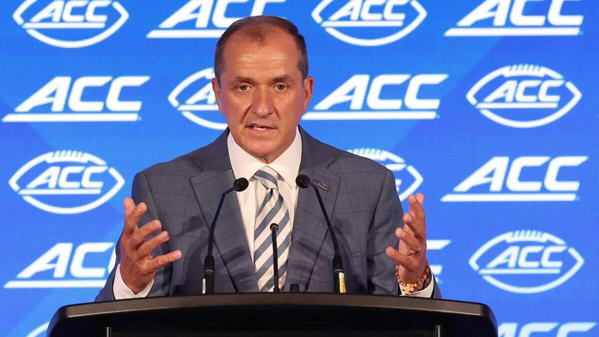 ACC Commissioner Jim Phillips responds to a question during the 2026 ACC Football Kickoff program at the Hilton Charlotte Uptown Hotel in Charlotte, North Carolina, on Wednesday, July 15, 2026.