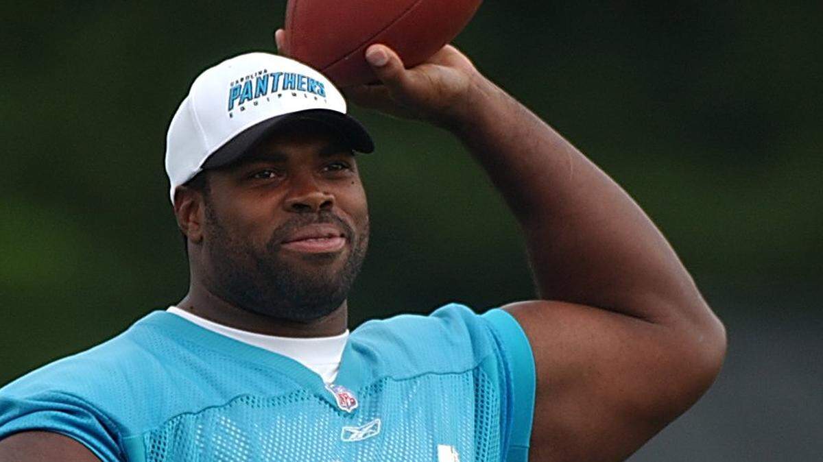Panthers defensive tackle Sean Gilbert warms up before a training camp practice in 2002. Gilbert cost the Panthers two No. 1 draft picks in what is widely regarded as one of the worst personnel moves Carolina ever made.